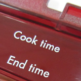 Electrolux printed cooker fascia printing onto plastic pad printed lens polycarbonate.